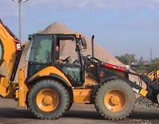 Koparko-ładowarka Caterpillar 444E